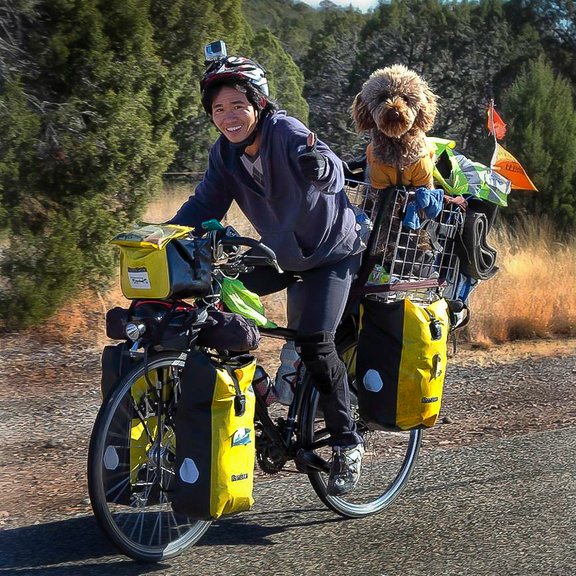 Cari and his dog Harry go on a world tour by bike.